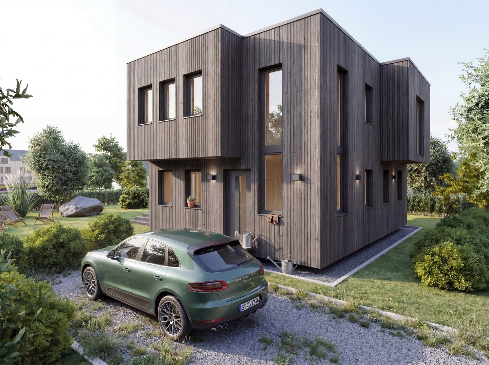 Kubisches Holzhaus mit dunkler Fassade